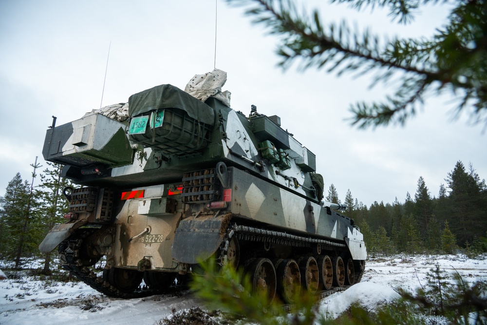 A Finnish Army K9 Moukari self-propelled howitzer preparing to fire during a NATO field exercise in Finland