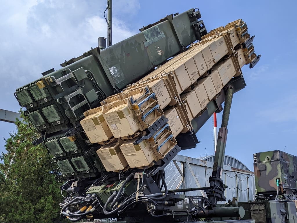 A U.S. Army Patriot M903 launcher loaded with PAC-3 and PAC-3 MSE missile canisters on static display