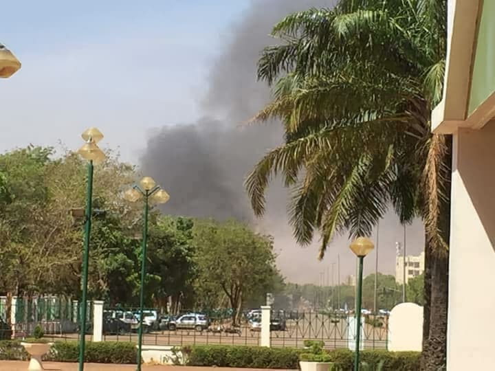 Smoke rises over Ouagadougou from the French Embassy compound during JNIM's coordinated attack on March 2, 2018