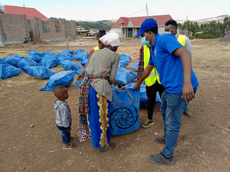 USAID staff distributing emergency shelter kits to displaced people in Tigray, Ethiopia, March 2021