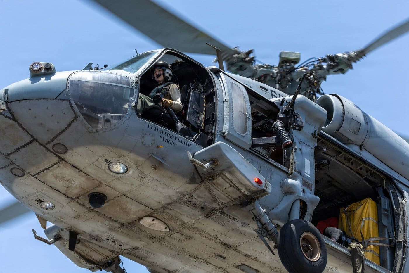U.S. Navy MH-60 Sea Hawk helicopters supporting Project Freedom in the Strait of Hormuz; Sea Hawk and Army AH-64 Apache helicopters were used to engage Iranian small boats threatening commercial shipping