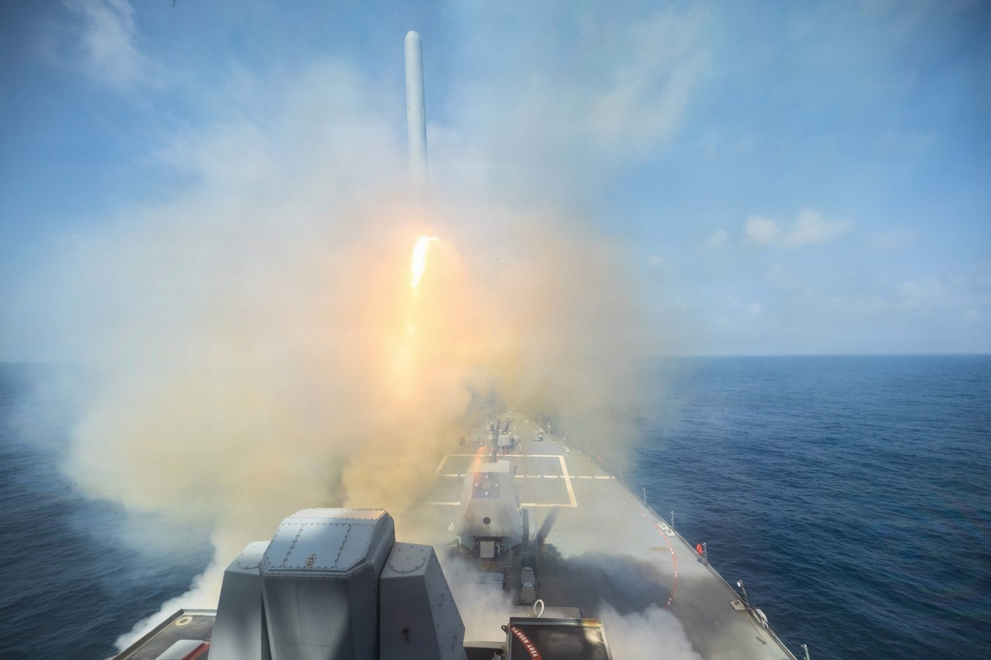 Destroyer USS Spruance fires a Tomahawk Land Attack Missile in support of Operation Epic Fury, illustrating the kind of US Navy strikes resumed against Iranian missile sites and boats on May 25, 2026
