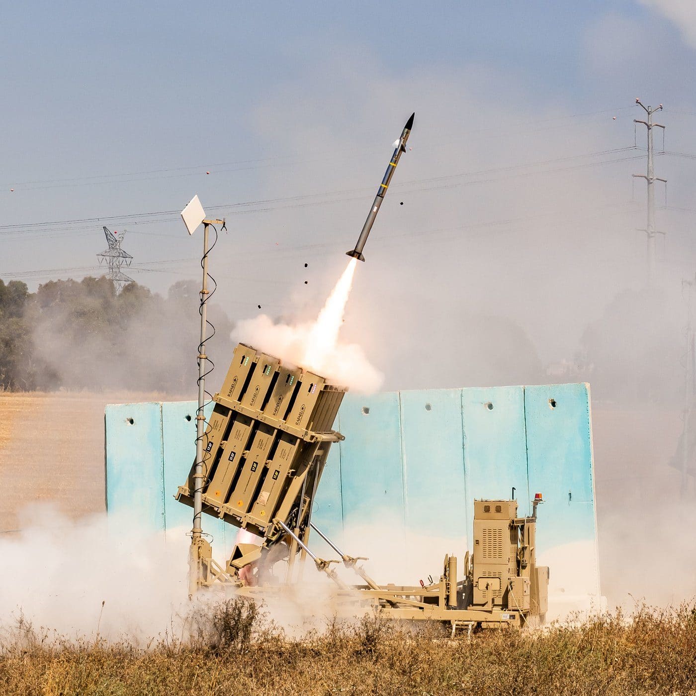 An Israeli Iron Dome launcher firing an interceptor missile