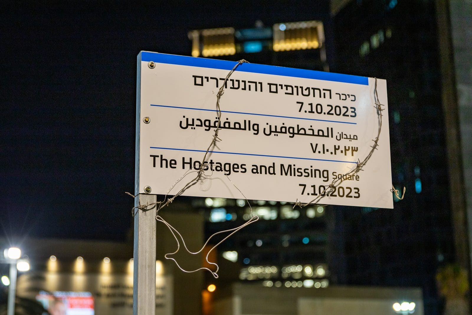 Hostages Square in Tel Aviv, filled with yellow ribbons, photographs and displays memorializing hostages taken on October 7