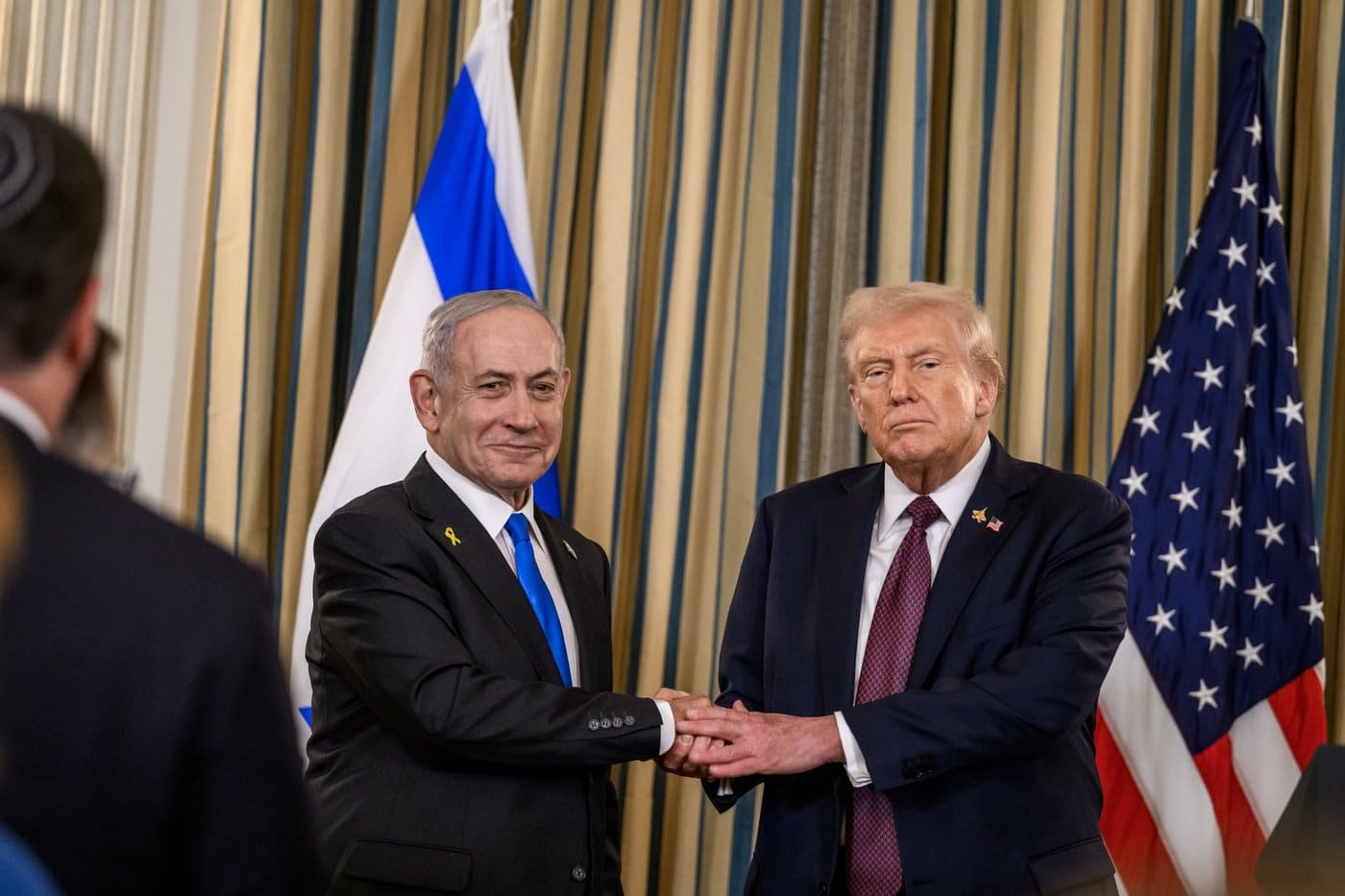 President Trump and Israeli Prime Minister Netanyahu shake hands after their joint press conference announcing the 20-point Gaza peace plan, September 29, 2025