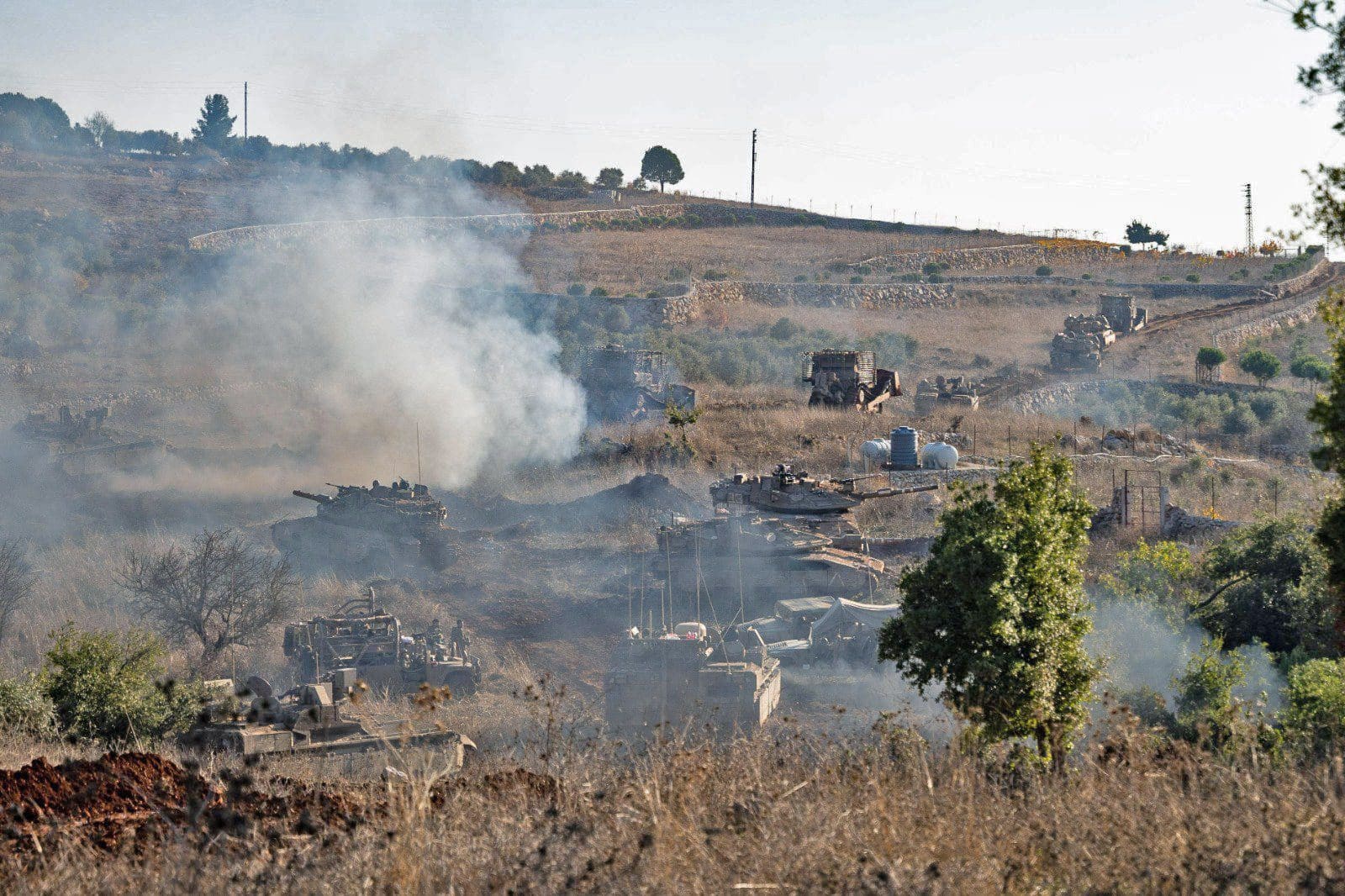 Israeli soldiers and armored vehicles during ground operations in southern Lebanon, November 2024