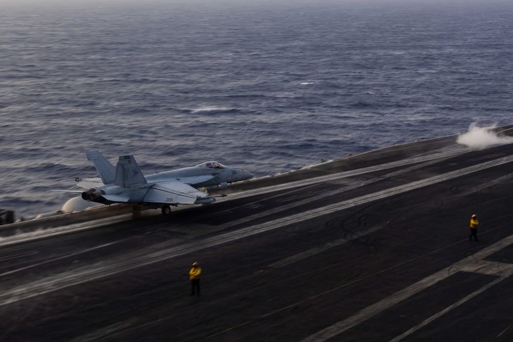An F/A-18E Super Hornet launches from the carrier USS Harry S. Truman during Operation Rough Rider strikes on Houthi targets in Yemen, March 30, 2025
