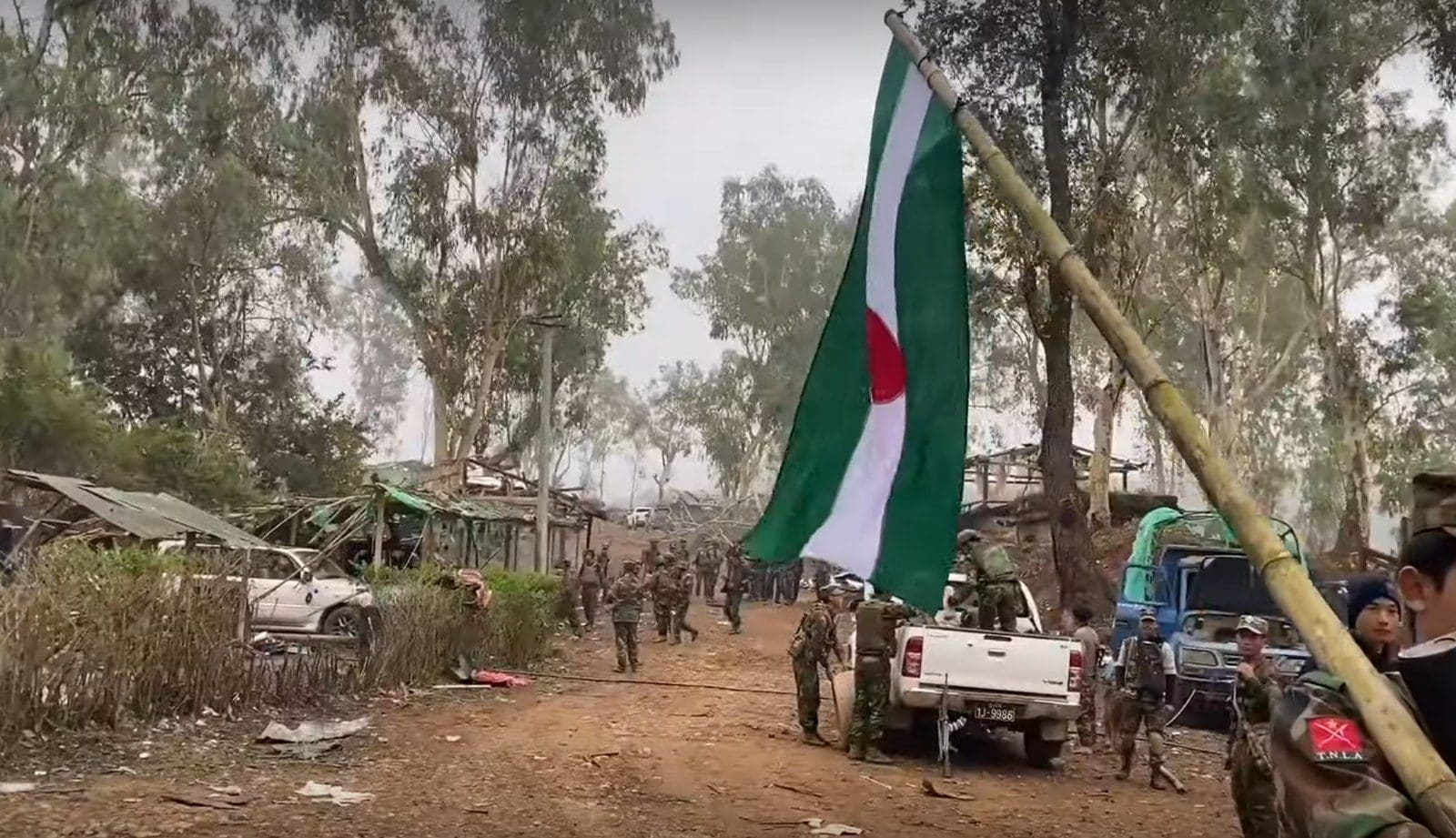 TNLA fighters after capturing the towns of Namhsan and Namkham in northern Shan State during Operation 1027