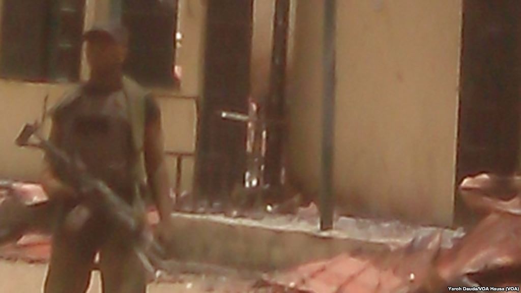 A soldier stands guard outside the Chibok school after the April 2014 kidnapping