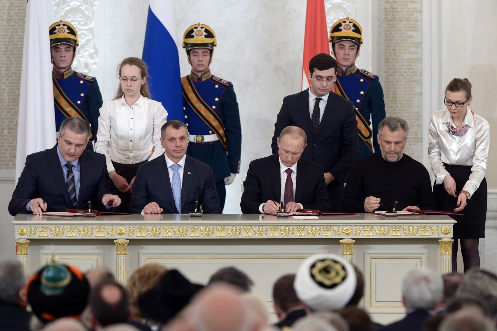 Putin signing the treaty on the accession of Crimea and Sevastopol to Russia, with Aksyonov, Konstantinov and Chaly, March 18, 2014