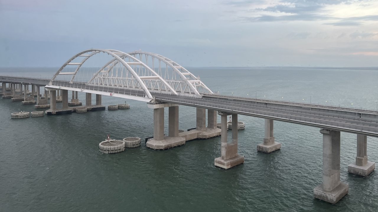 The Crimean Bridge's rail arch span photographed on the evening of October 8, 2022, hours after the explosion that collapsed sections of the adjacent road bridge