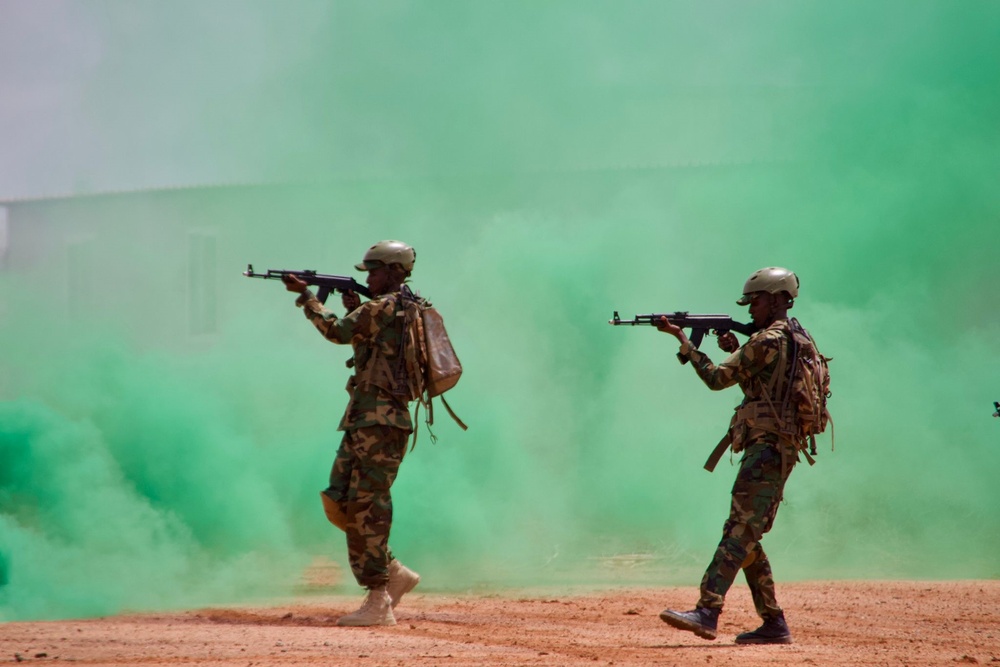 Recruits of the Somali National Army's Danab Advanced Infantry Brigade mark the completion of basic training at Baledogle Military Airfield