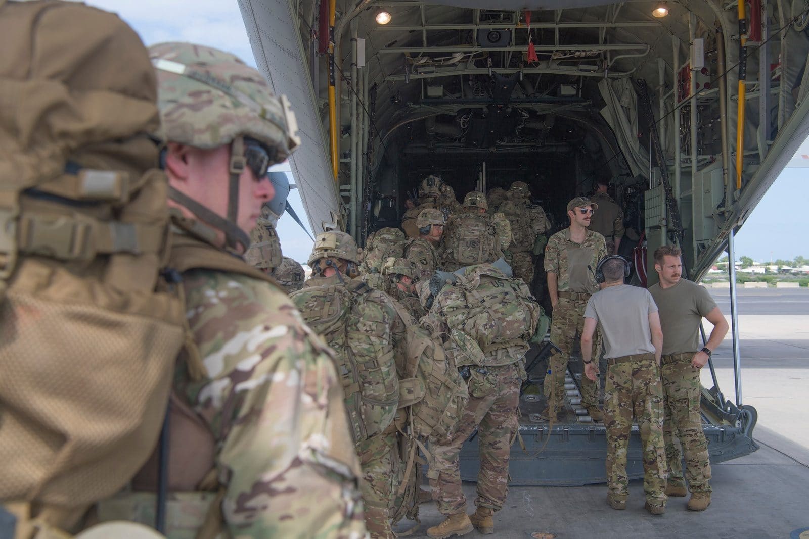 US Army East Africa Response Force soldiers board a C-130J at Camp Lemonnier, Djibouti, to reinforce security at Manda Bay after the attack