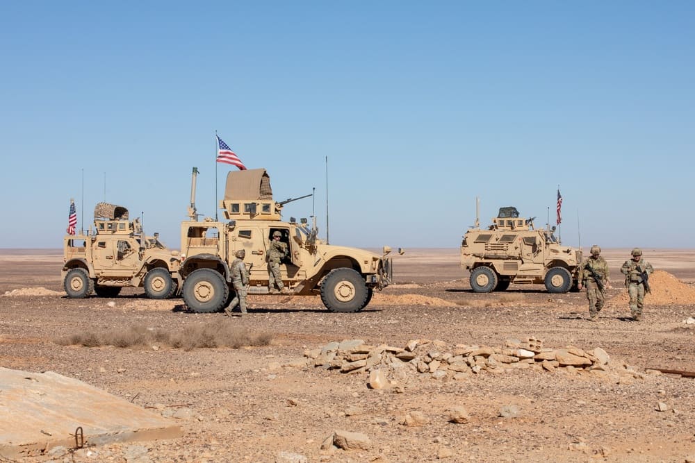 US Army soldiers providing security during a partnered patrol with Syrian forces in the Al-Tanf deconfliction zone