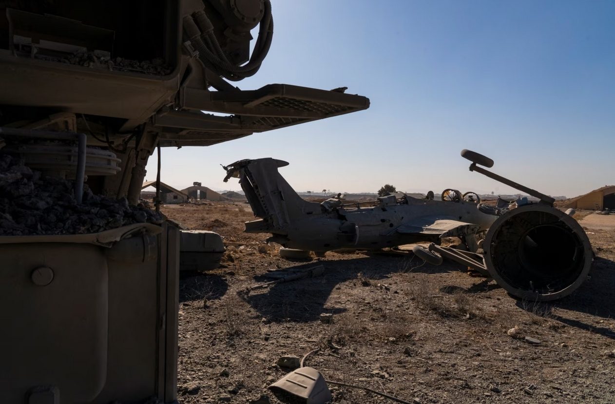 A Syrian warplane destroyed by an Israeli airstrike at Mezzeh Air Base