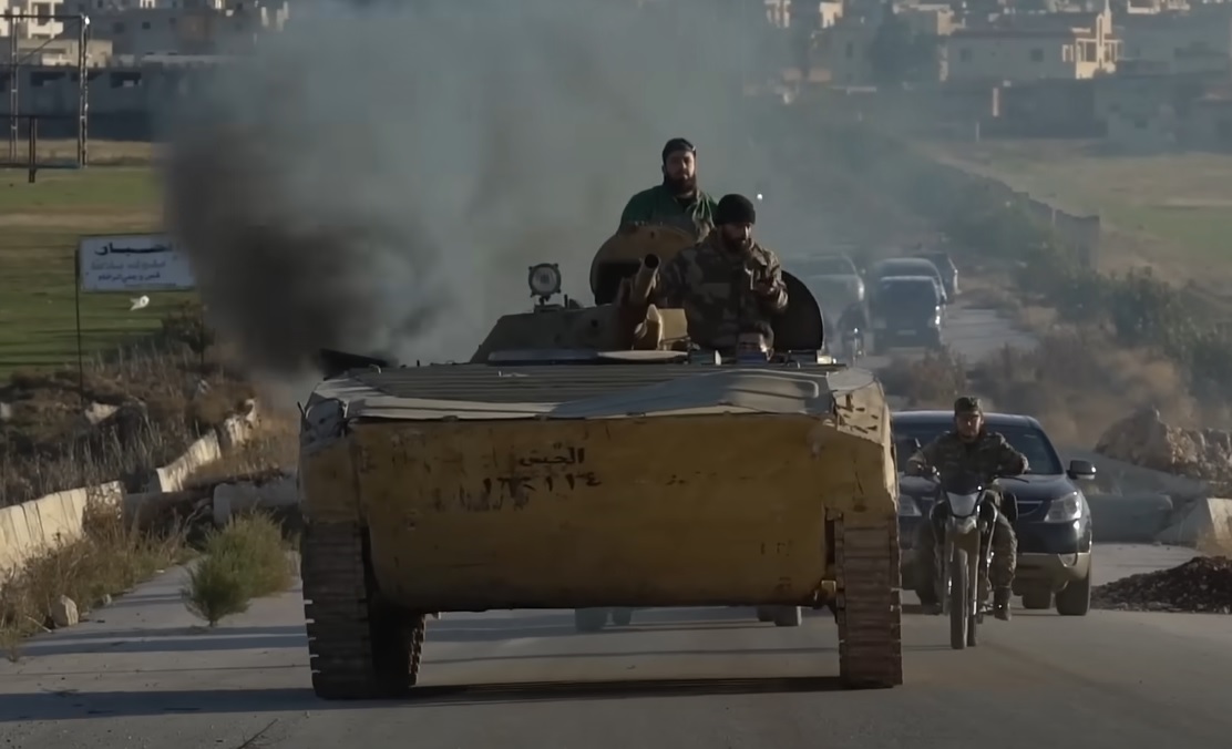 Opposition fighters entering Aleppo during the surprise HTS-led offensive
